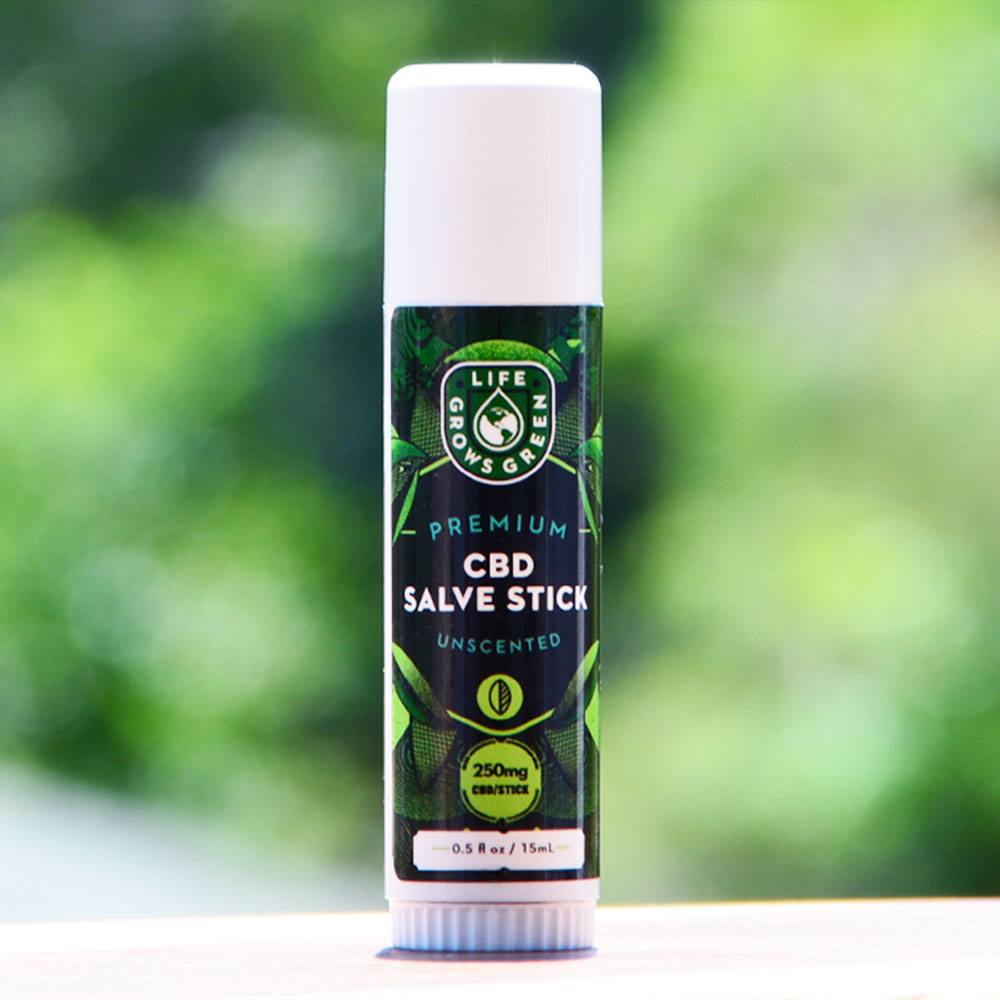 A topical CBD Salve Stick from Life Grows Green.