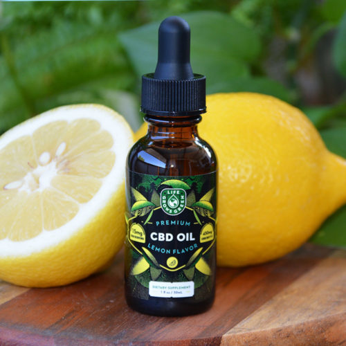 A bottle of 450mg CBD oil with lemon flavor.