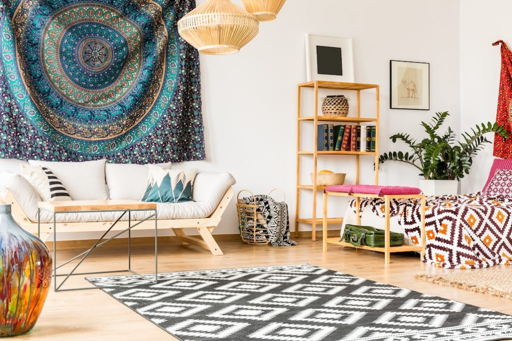 An eclectic bohemian style bedroom. 