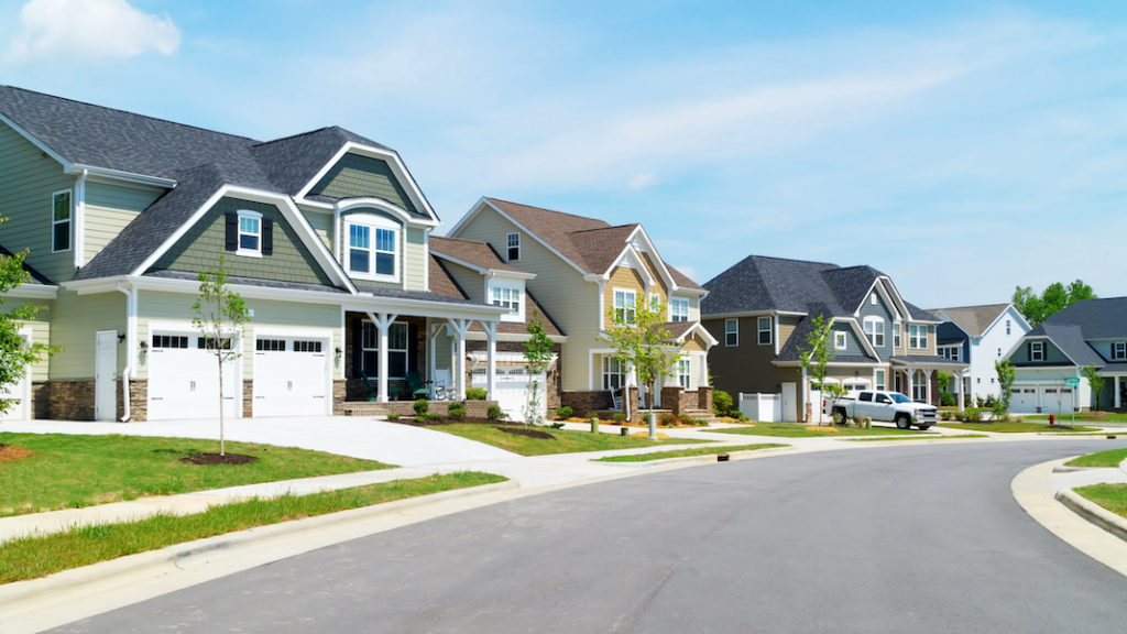 A street full of suburban homes.