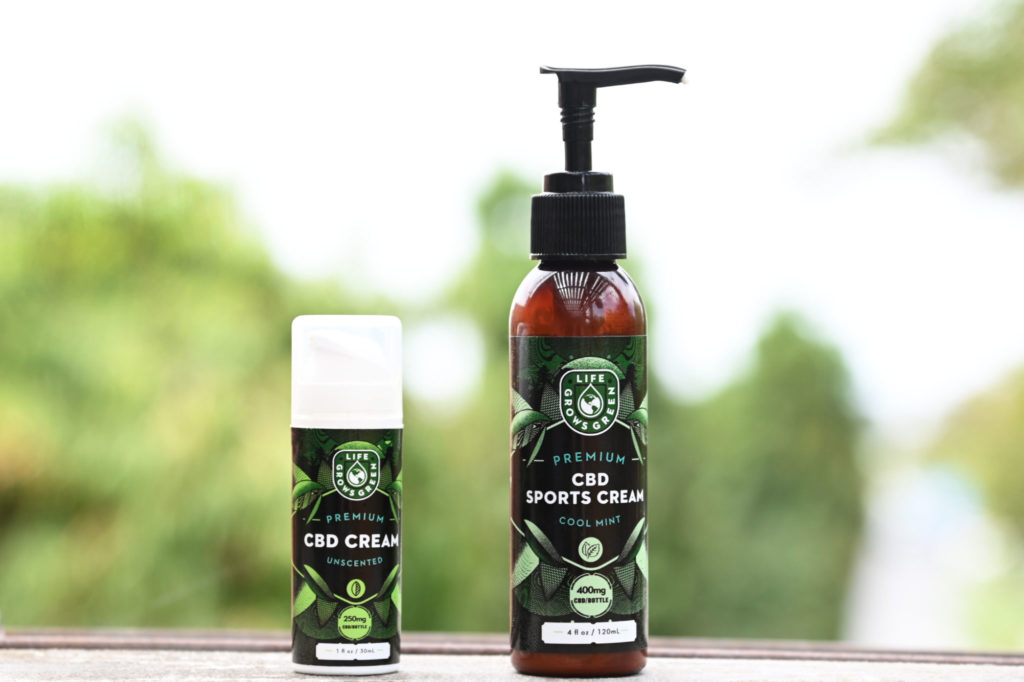 A bottle of CBD Cream and CBD Sports Cream from Life Grows Green.