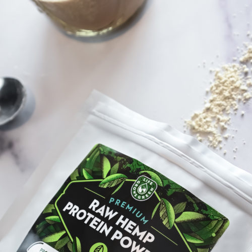 A bag of raw hemp protein powder on a white counter top.